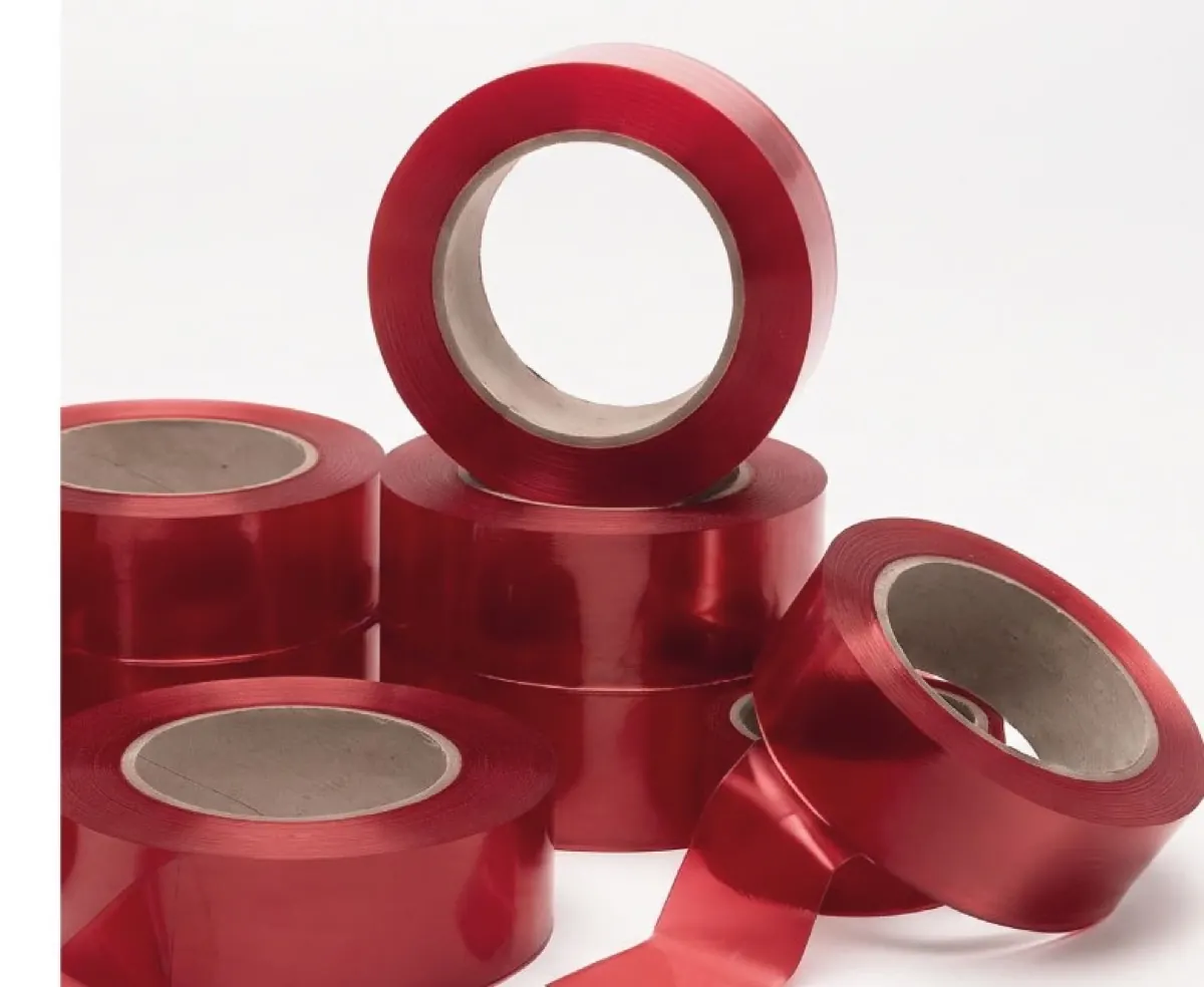 Rollos de cinta autoadhesiva roja